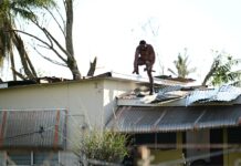 Opinion: Providing shelter is a critical challenge A resident in Black River, St. Elizabeth, repairs his roof in the aftermath of Hurricane Melissa.