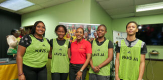NAVS JA unveils landmark volunteer initiative to power Jamaica’s sporting future NAVS JA President Allison Watson flanked by four NAVS JA Volunteers at the Media Launch Event