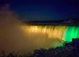 Niagara Falls lit in Jamaican colors to mark 60 years of farm work program