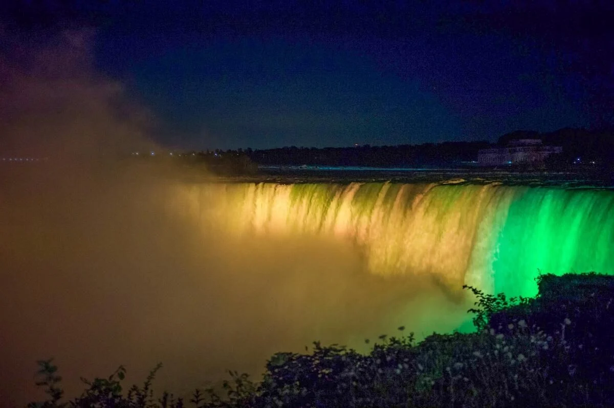 Niagara Falls lit in Jamaican colors to mark 60 years of farm work program