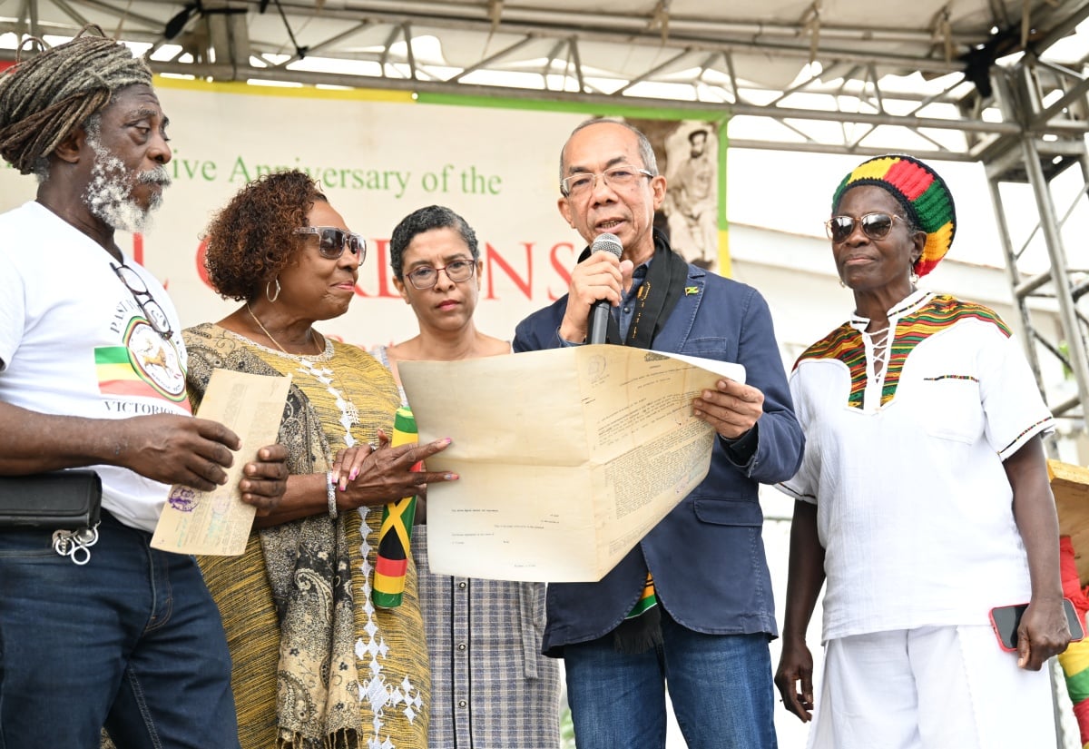Jamaican government hands over land titles to Rastafari group