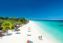 ‘100% illegal’: Jamaican hotelier slams fence blocking Seven Mile Beach access for residents